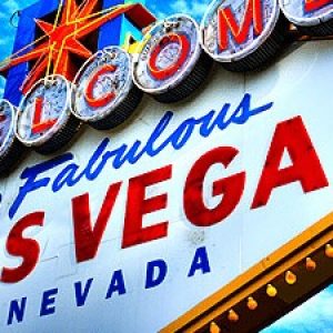 The famous Las Vegas sign under a blue sky
