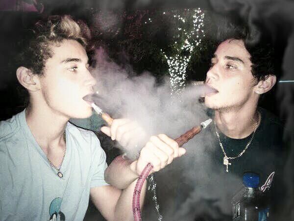 Two bros enjoying a hookah