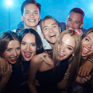 Friends enjoying a nightclub crawl in Las Vegas