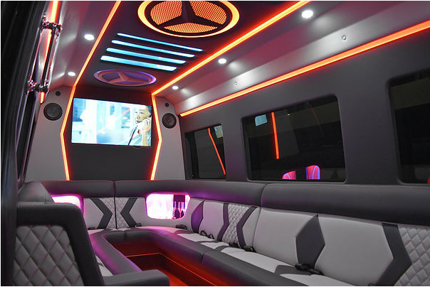 Plush interior of the TROUBLEMAKER Mercedes Sprinter party bus with seating for up to 14 passengers